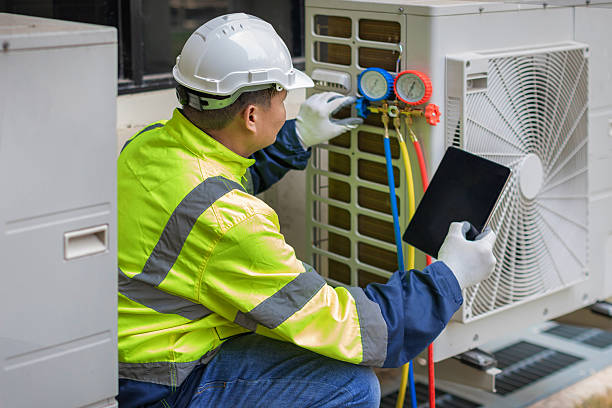 Professional Air Conditioning Repair technician working in Lowellville, OH